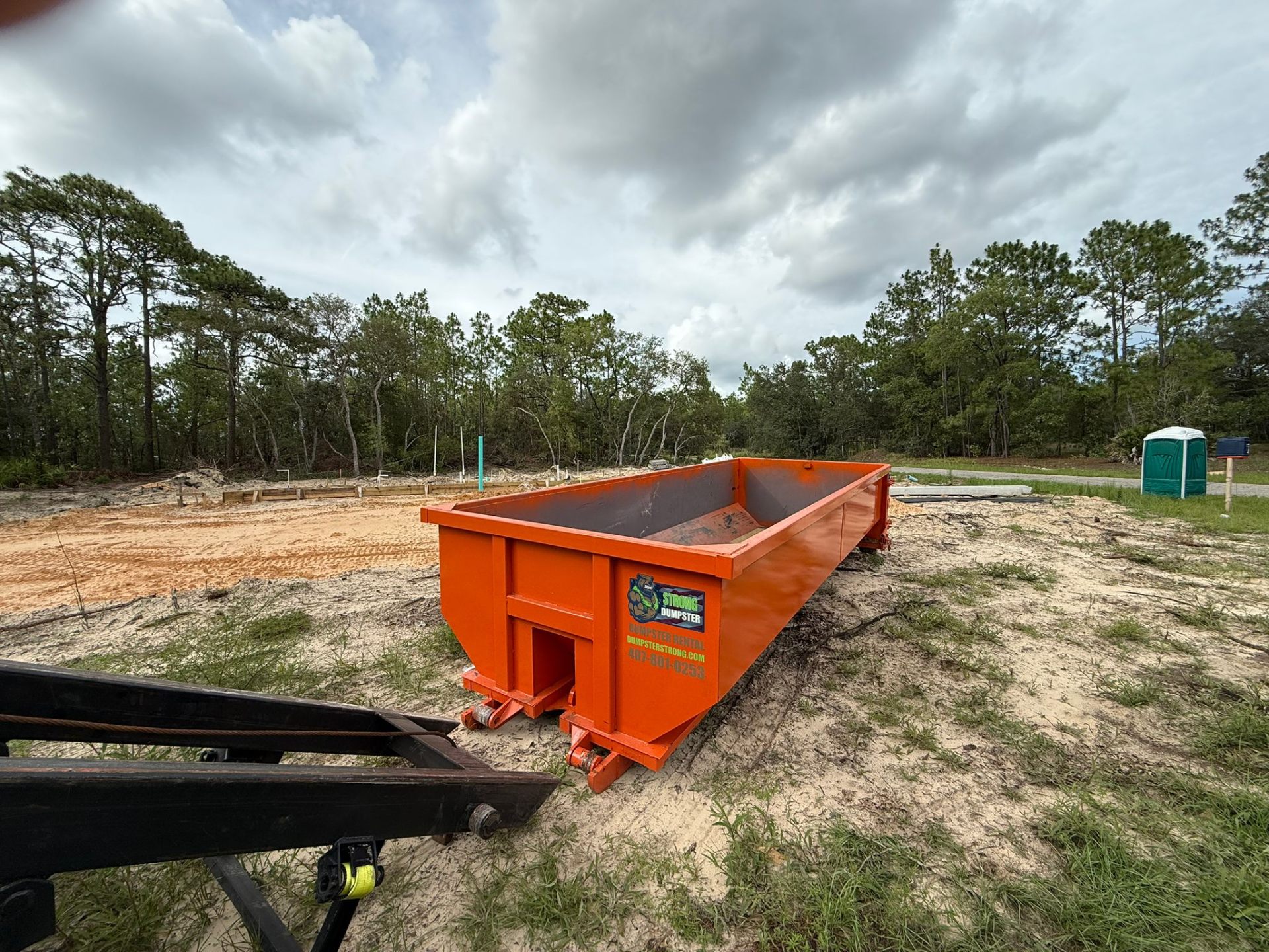 Dumpster Strong container on construction job site in Orlando