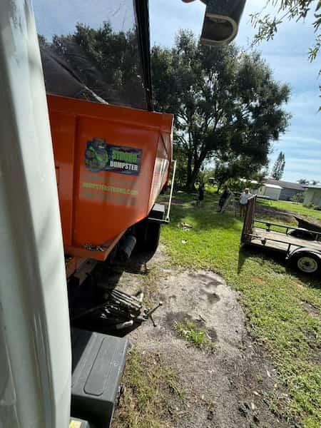 Dumpster on rural property near St. Cloud
