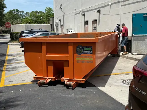 20 yard Dumpster Strong roll-off container at a commercial site in Oviedo FL