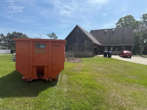 Construction dumpster rental on a Seminole County job site near Oviedo FL