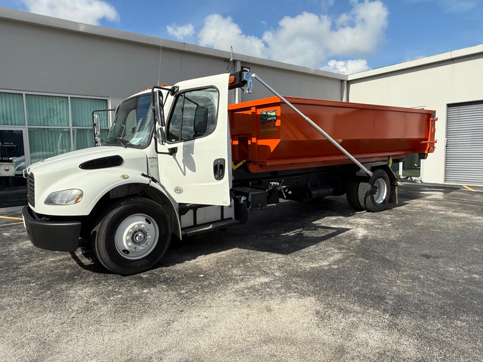 Dumpster Strong hook-lift truck in Central Florida