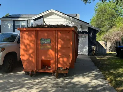 30 yard Dumpster Strong dumpster on a residential driveway near Windermere