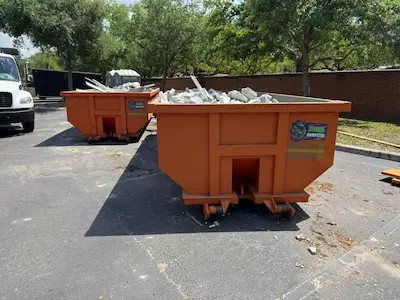 Dumpster Strong dumpsters loaded with construction debris in Windermere FL